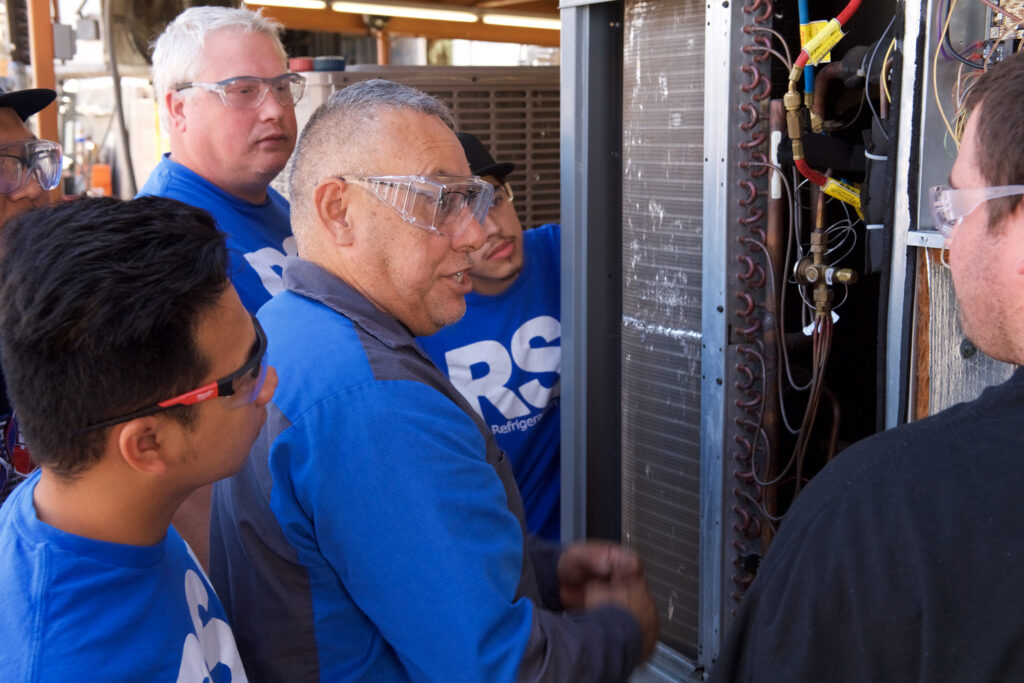 RSI students learning HVAC on site